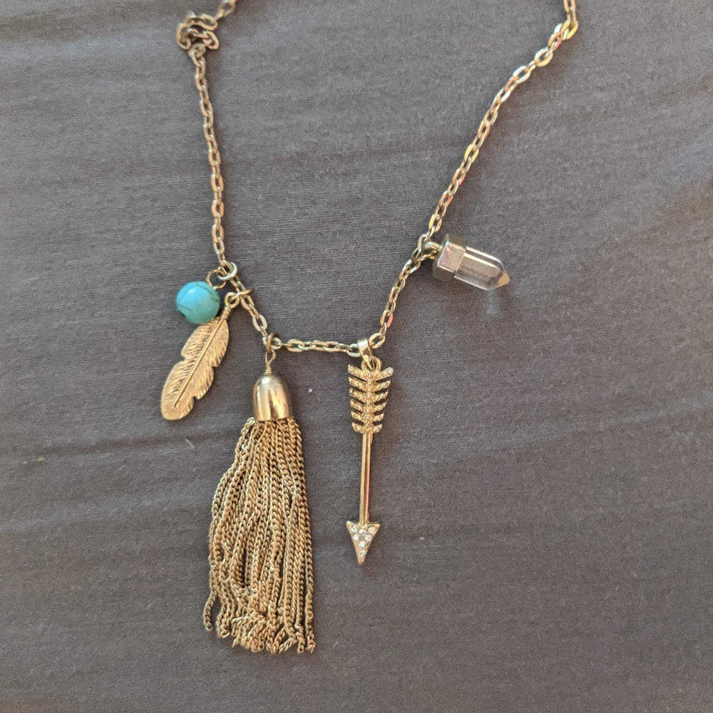 Long Gold Necklace with Adornments